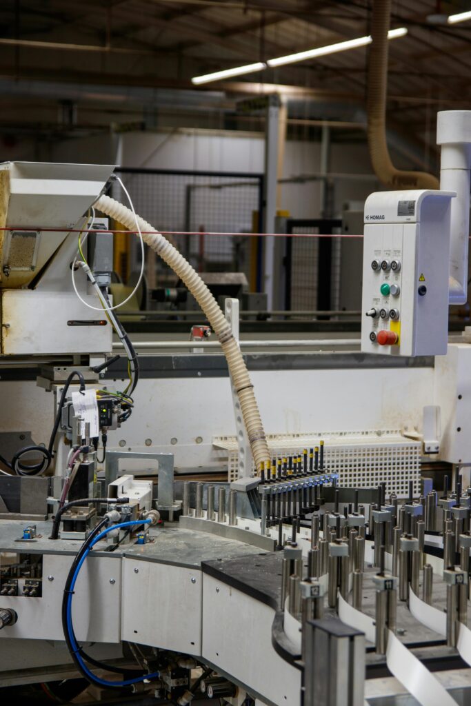 Close-up of automated machinery in an industrial factory setting, perfect for industry and technology themes.